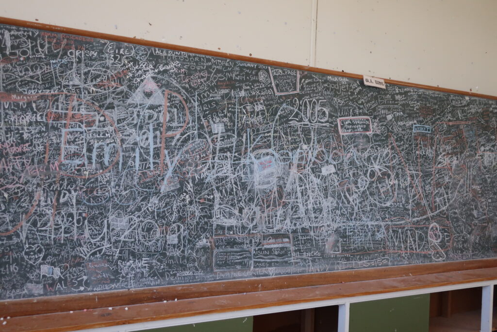 Classroom blackboard in a now deserted school.